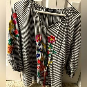 Gorgeous boho chic top. Colorful embroidery on sleeve and front. Large